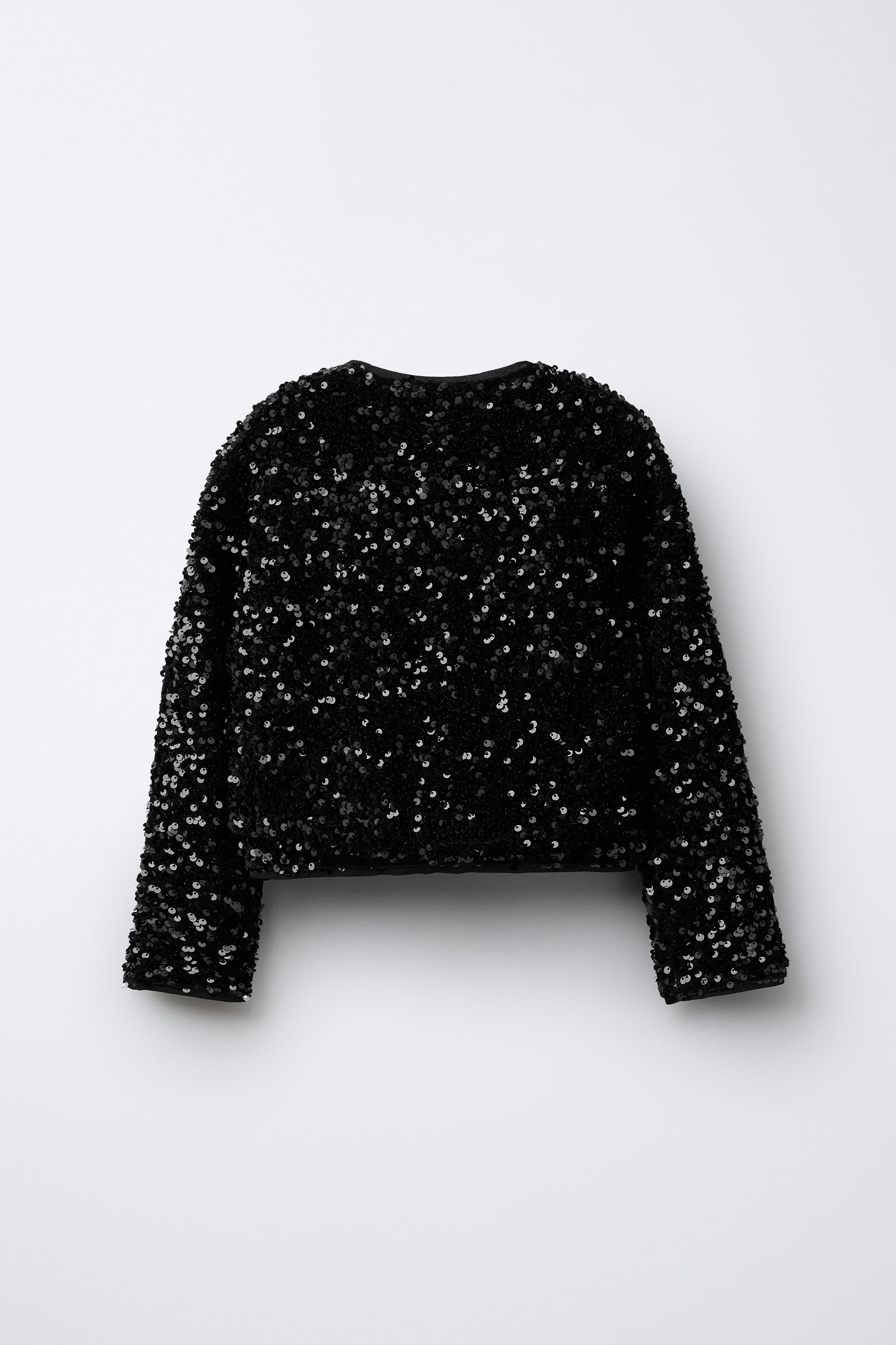 SEQUINED BOW BOLERO